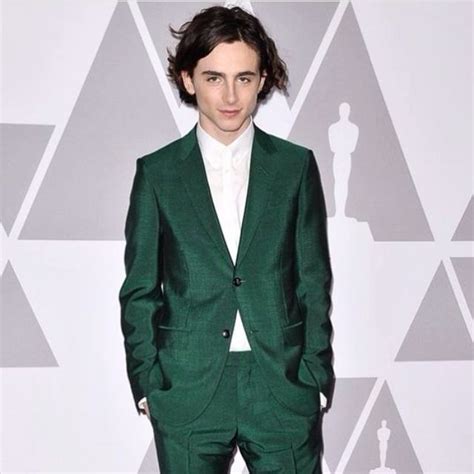 green gucci suit producer